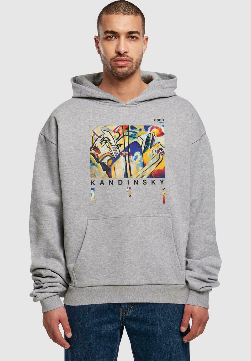 Felpa grigia con tasca frontale, caratterizzata da una stampa artistica colorata di Kandinsky centrata sul petto. Vestibilità comoda con polsini e orlo a coste.