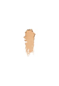 Flytende foundation-svamp i lys beige, med en jevn tekstur og en lett glansfull finish, vist på en hvit bakgrunn.