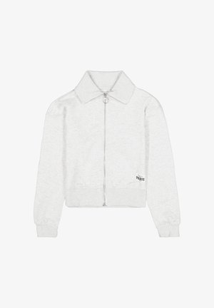 Sweat-shirt court gris clair avec fermeture éclair, grand col, poignets côtelés et texte "Paris" sur le devant. Tissu doux et texturé.