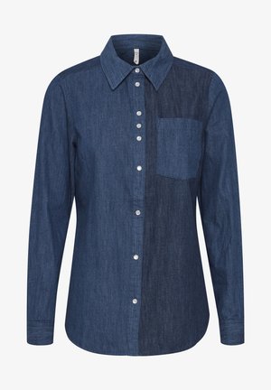 Ziltais džinsi krekls ar garām piedurknēm, divu toņu zila auduma, ar pogu slēgšanu un metāla pogām, kreisajā pusē ir krūšu kabata.