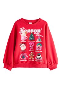 Felpa rossa con grafica festiva che presenta icone a tema natalizio, tra cui Babbo Natale, regali e decorazioni, con colori vivaci e giocosi.