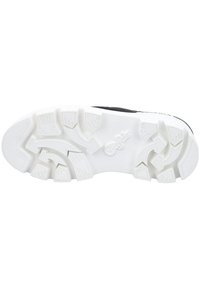 Semelle de chaussure blanche avec des crampons en forme de flèche texturés et le logo « Buffalo » embossé au centre, conçue pour l’adhérence et la durabilité.