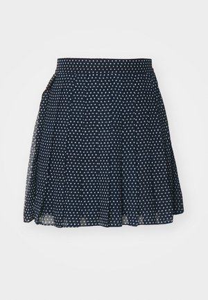 Marine rok met een klein wit sterrenpatroon, geplooid ontwerp, hoge tailleband en lichtgewicht stof voor optimale bewegingsvrijheid.