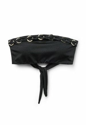 Haut bandeau noir avec bordure tressée ornée d'anneaux argentés et nœud noué à l'avant, présenté sur un fond blanc.