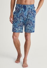 Marine zwemshorts met een blauwe octopusprint, gemaakt van lichtgewicht materiaal met een elastische tailleband en functionele zakken.