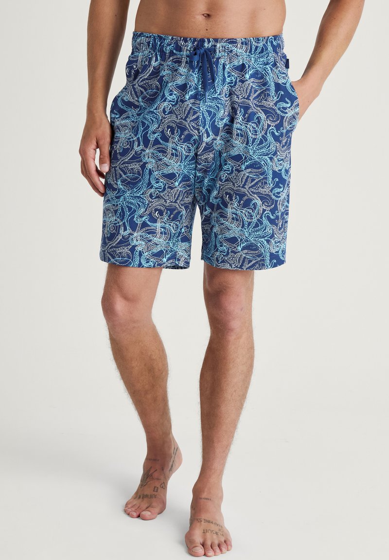 Marine zwemshorts met een blauwe octopusprint, gemaakt van lichtgewicht materiaal met een elastische tailleband en functionele zakken.
