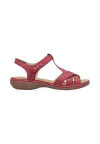 Sandale rouge en cuir à bout ouvert avec bride réglable à la cheville, semelle intérieure beige rembourrée et semelle basse marron avec surpiqûres blanches.