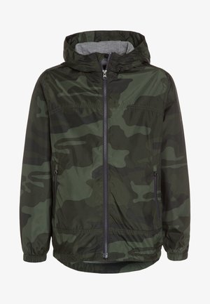 Tarnmusterjacke in dunklen Grüntönen, aus leichtem Stoff gefertigt. Verfügt über eine Kapuze, einen Frontreißverschluss und elastische Bündchen.