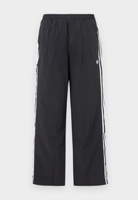 Μαύρο παντελόνι φόρμας Adidas με ελαστική μέση, λευκές πλαϊνές ρίγες και το λογότυπο της Adidas στο πάνω αριστερό μηρό, με ίσια γραμμή.