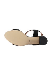 Sandal nero con suola liscia, design aperto e cinturini regolabili. La parte inferiore è beige con un motivo testurizzato e indicazione della taglia.