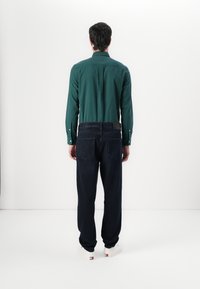 Tommy Hilfiger TAPERED HARLEM WINDUM  - Straight leg -farkut - windum blue black
