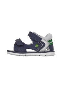 Sandalo per bambini blu navy con accento a forma di stella verde, tacco a strisce bianche e verdi, parte superiore in tessuto, punta chiusa e cinturini in Velcro.