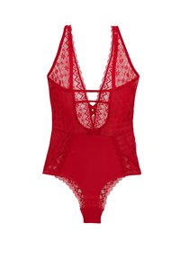 Bodysuit en dentelle rouge avec décolleté en V plongeant, dos strappé et bordure en forme de vagues. Partie inférieure lisse avec fermetures à pression au bas.