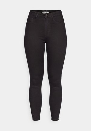 Black high-waisted skinny jeans with front button and zipper, belt loops, and five-pocket styling displayed against a white background.