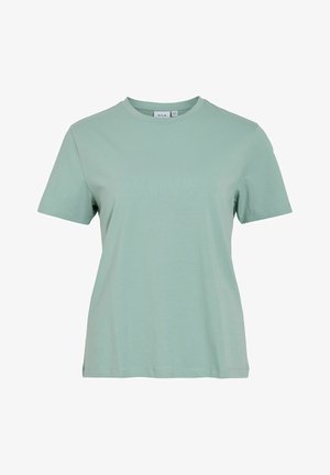 Heleroheline puuvillane t-särk ümmarguse kaelusega ja lühikeste varrukatega. Sile tekstuur, lõdvestunud istuvus, minimalistlik disain ja nähtamatud kaunistused.