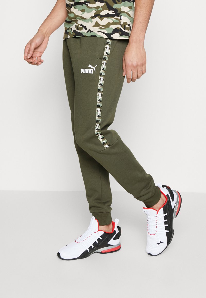 Puma Tracksuit bottoms green moss/green Zalando.co.uk