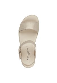 Light gold women's sandal with two wide straps, adjustable ankle strap, and cushioned insole. Smooth texture and simple design.