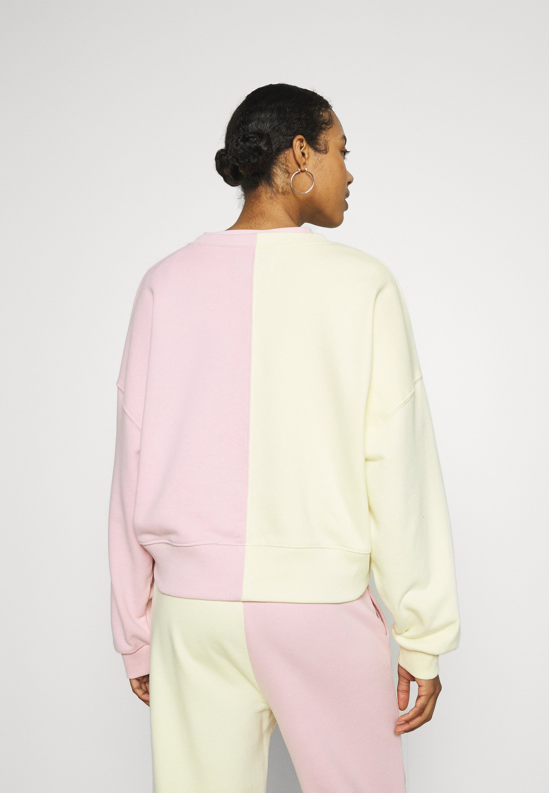 pale yellow crew neck sweatshirt