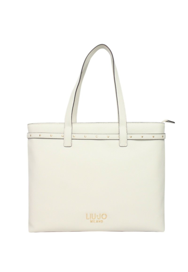 Borsa a tote bianca in pelle con due manici, dettagli in metallo dorato e una fila decorativa di piccoli chiodi lungo il bordo superiore. Logo visibile sulla parte anteriore.