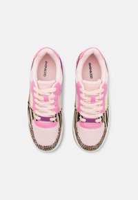 Multicolored sneakers featuring a pink mesh upper, zebra print accents, and purple detailing with white laces and a textured sole.