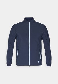 Navy jacket with a textured fabric, full zip front, contrasting light blue zip details, and two side pockets. Round logo at the bottom left.