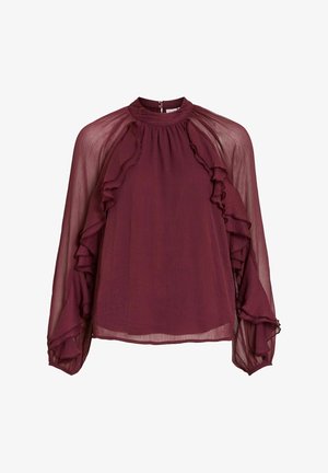 Burgunderfarbene Bluse mit langen, transparenten Ärmeln, Rüschendetails am Ausschnitt und den Ärmeln sowie einem hohen Kragen. Knopfverschluss auf der Rückseite.