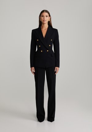 ANDIATA LUCIA - Trousers - black