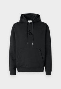 Sweatshirt de algodão preta com capuz, bolso frontal, cordão e logótipo Calvin Klein em relevo no peito. Textura suave, punhos canelados.