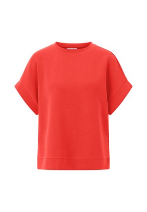 T-shirt a maniche corte di un vivace colore rosso, realizzato in tessuto morbido, con scollatura rotonda e una vestibilità rilassata con orli delle maniche piegati.
