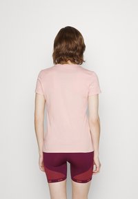 Puma Triko s potiskem - light pink