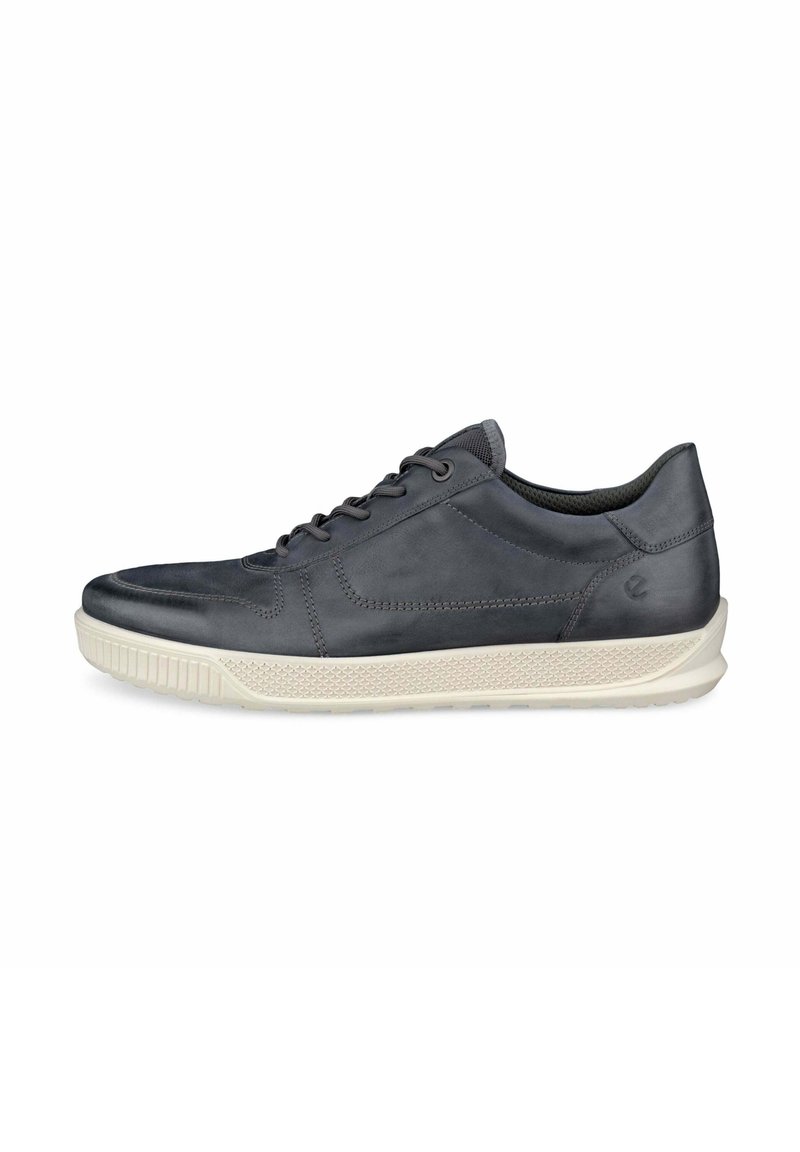 Szare skórzane sneakersy o gładkim wykończeniu, zakrzywionej sylwetce, kontrastowej białej gumowej podeszwie oraz minimalistycznym wzorze sznurowania.