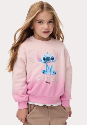 Sudadera rosa con un diseño en degradado que presenta a Stitch de Disney. Incluye detalles acolchados y puños acanalados, fabricada con una tela suave.