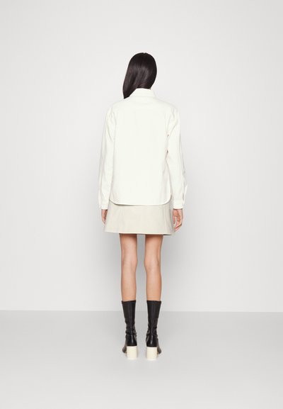 Iro BAILA - Minijupe - white