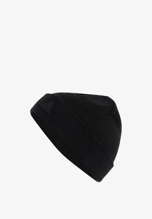 Black knitted beanie with a folded cuff, featuring a textured pattern and a small black logo patch on the side.