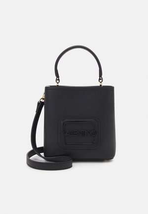 Black Valentino handbag with top handle and detachable shoulder strap, rectangular shape, and embossed logo on front center.
