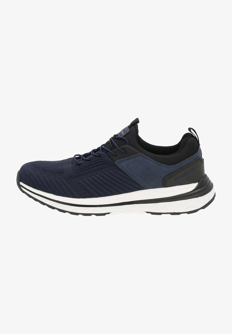 Chaussure de sport bleu marine avec une tige en maille texturée, accents noirs contrastants, semelle rembourrée et un design minimaliste présentant des lignes subtiles.