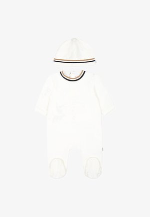 Romper bianco per neonati con maniche lunghe, chiusura a pressione sul retro e un cappellino bianco abbinato con strisce marroni e nere. Tessuto in cotone morbido.