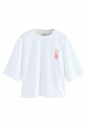 Weißes Baumwoll-T-Shirt mit oversized Schnitt, rundem Halsausschnitt und kurzen Ärmeln; verfügt über eine kleine rote Vasen-Grafik mit floralem Design auf der Brust.