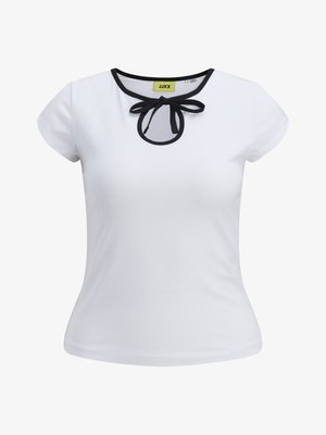 Bijela majica kratkih rukava s crnim obrubom oko izreza i detaljem mašne u središtu. Izrađena od glatkog pamučnog materijala.