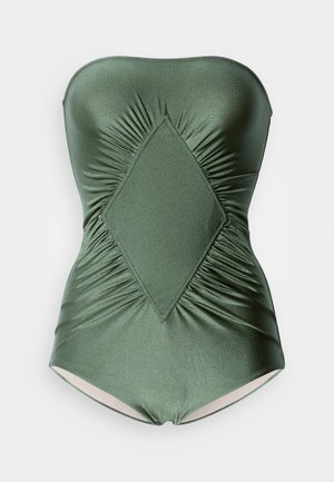 Maillot de bain une pièce vert foncé, sans bretelles, avec une texture froncée et un accent en forme de diamant au centre. Tissu lisse avec un léger éclat.