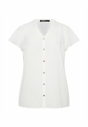 Blouse blanche à manches courtes avec col en V et six boutons sur le devant, avec une étiquette au niveau du col.