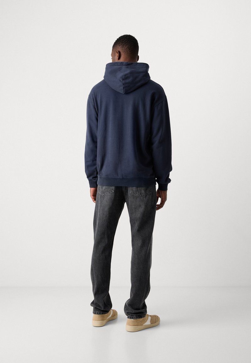 BOSS - Delaware Slim-fit jeans van blauw denim met een kasjmierachtige feel - Blauw