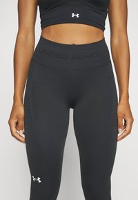 Under Armour TRAIN SEAMLESS - Tights - black/white