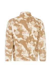 Fleece-pullover i beige og creme med et abstrakt mønster. Høj krave, lange ærmer og blød tekstur. Behageligt design til varme.