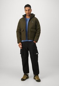 Jack Wolfskin NORTHERN LITE HOODED  - Veste d'hiver - obsidian moss