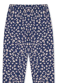Leggings navy avec un motif léopard en rose clair. Dotées d'une taille élastique et d'une texture de tissu doux.