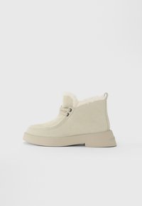 Winter boots - beige