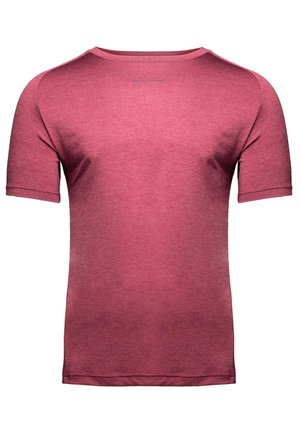 T-shirt de sport uni à manches courtes en tissu chiné rose profond avec un col rond discret et une coupe slim.