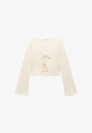 Kremfarvet strikket kort cardigan med lange ærmer og to forreste bindelukninger i et delikat zigzagmønster.