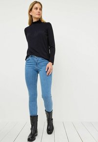 Tamaris T-shirt à manches longues - black beauty